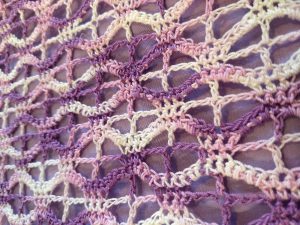 purple and white lace over white fabric scripture cover