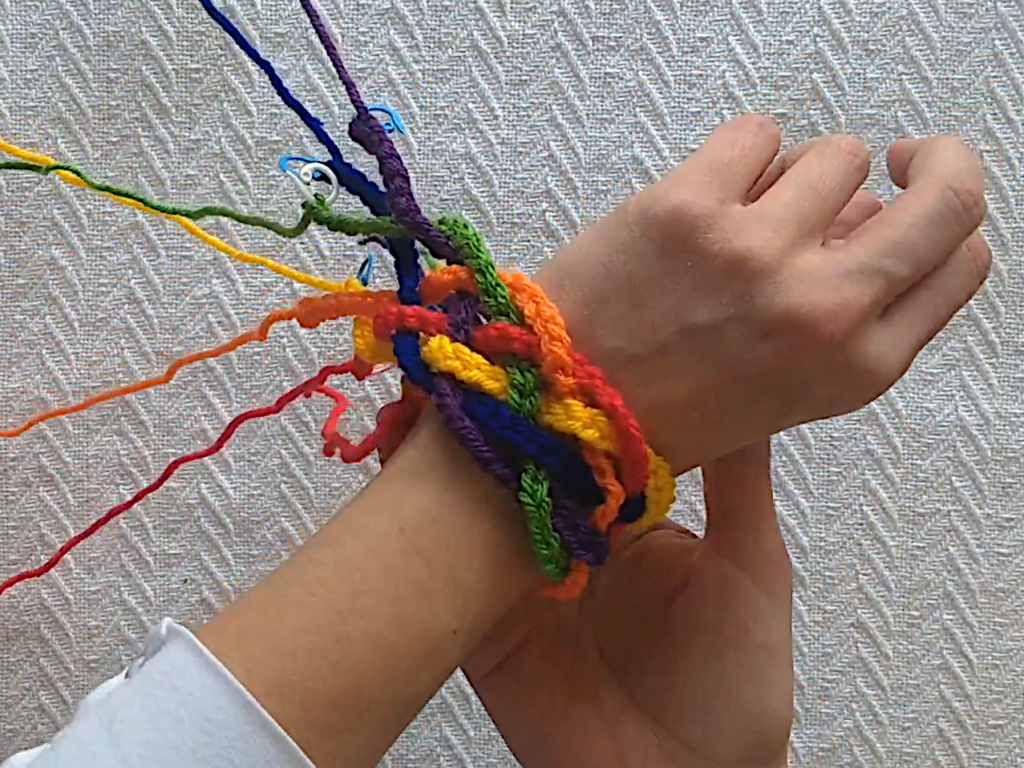 Fitting the rainbow braid bracelet