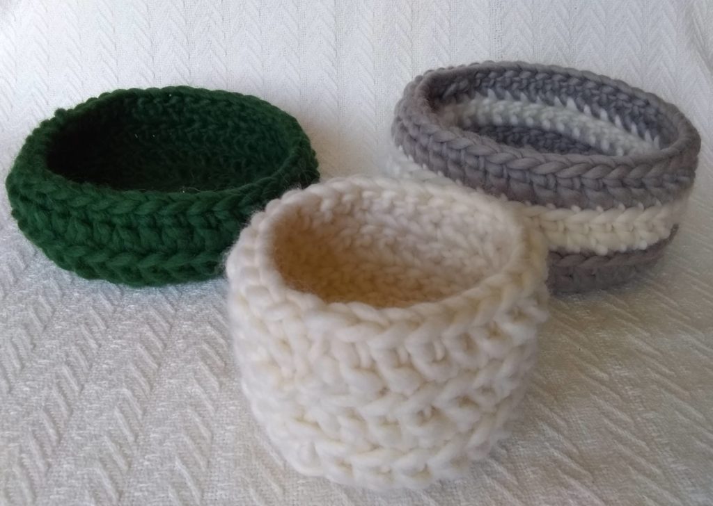 White, Silver, and Green Crocheted Baskets