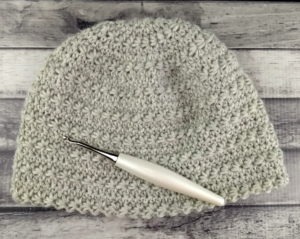 Stella Hat - Gray crocheted hat with white crochet hook