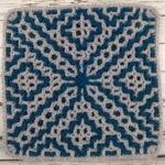 Blue and Gray geometric design interlocking crochet square worked in the round
