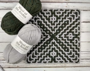 Green and Gray yarn with a geometric crocheted afghan square