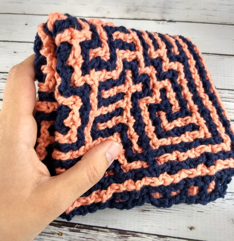 Blue and Peach folded crocheted washcloth