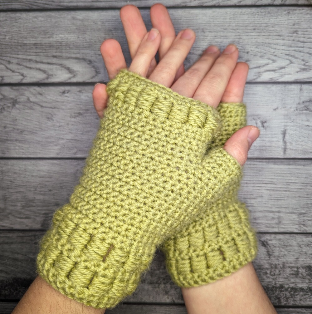 Block Party Glove Crochet Pattern - Green Crochet Fingerless Glove with block stitches on the cuff and finger opening